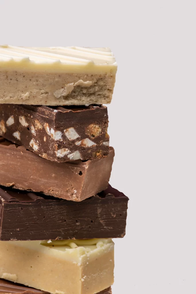 Milk, dark, and white chocolate pralines stacked. World famous from The Chocolate Caper in Oregon, Wisconsin.
